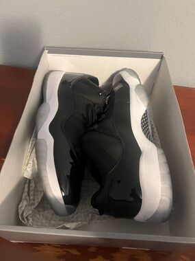 Jordan Men's Black and White Low-Top Retro 11 space jam
